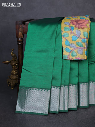 Mangalgiri silk cotton saree green and mustard yellow with plain body and temple design silver zari woven border