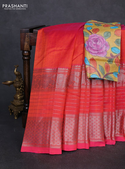 Mangalgiri silk cotton saree dual shade of pinkish orange and mustard yellow with plain body and long silver zari woven border