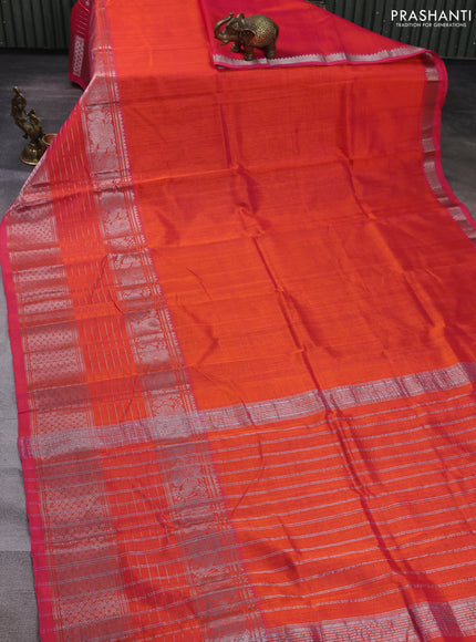 Mangalgiri silk cotton saree dual shade of pinkish orange and mustard yellow with plain body and long silver zari woven border