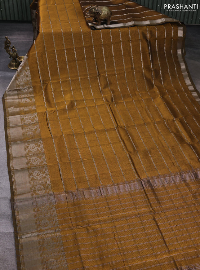 Mangalgiri silk cotton saree dark mustard yellow and cs blue with allover silver zari weaves and annam silver zari woven border