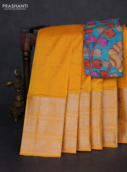 Mangalgiri silk cotton saree mustard yellow and teal blue with plain body and long annam silver zari woven border