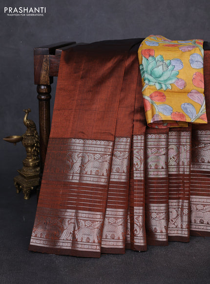 Mangalgiri silk cotton saree rust shade and mustard yellow with plain body and long silver zari woven border