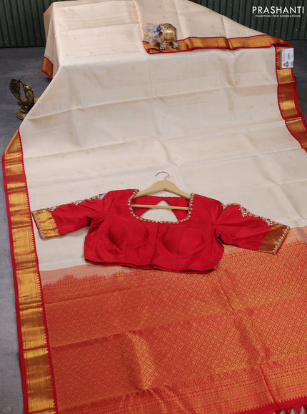 Pure kanchipuram silk saree cream and red with allover zari woven buttas and zari woven korvai border with Aari work blouse