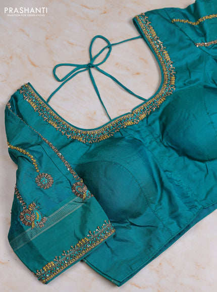 Pure kanchipuram silk saree elaichi green and teal green with zari woven buttas and temple design rettapet thread woven border with Aari work blouse