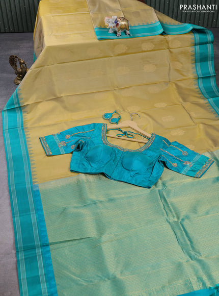 Pure kanchipuram silk saree elaichi green and teal green with zari woven buttas and temple design rettapet thread woven border with Aari work blouse