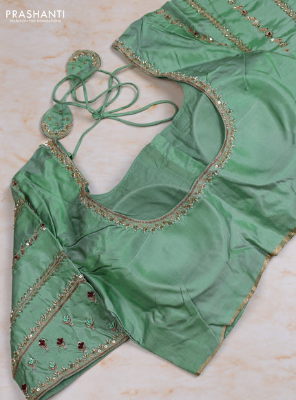 Pure kanchipuram silk saree purple and pastel green with allover zari woven buttas and simple zari woven border with Aari work blouse