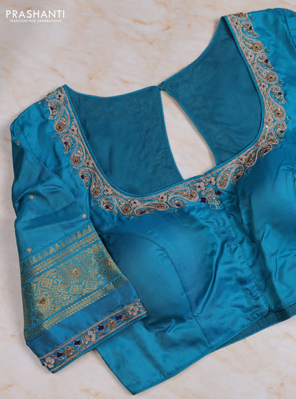 Pure kanchipuram silk saree violet and cs blue with allover zari woven buttas and zari woven korvai border with Aari work blouse