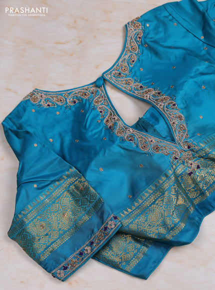Pure kanchipuram silk saree violet and cs blue with allover zari woven buttas and zari woven korvai border with Aari work blouse