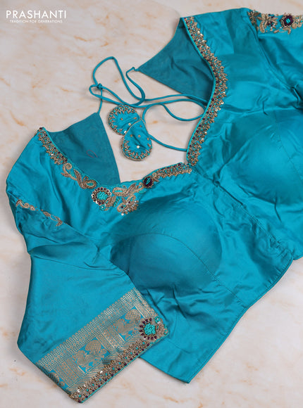 Pure kanchipuram silk saree deep wine and cs blue with allover zari woven buttas and zari woven border with Aari work blouse