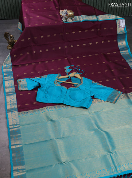 Pure kanchipuram silk saree deep wine and cs blue with allover zari woven buttas and zari woven border with Aari work blouse