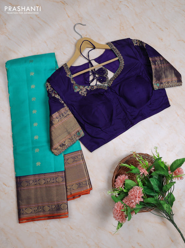 Pure kanchipuram silk saree teal green and navy blue with allover zari woven buttas and zari woven korvai border with Aari work blouse