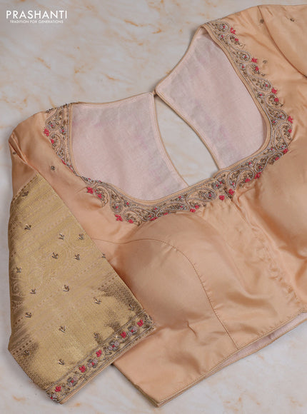 Pure kanchipuram silk saree peach pink and pastel peach with zari woven buttas and long zari woven border with Aari work blouse