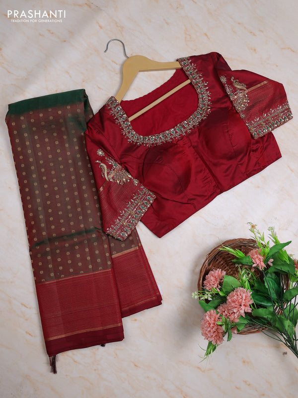 Pure kanchipuram silk saree dual shade of green and maroon with allover zari woven buttas and zari woven border with Aari work blouse