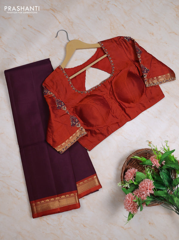 Pure kanchipuram silk saree deep wine and rust shade with plain body and small temple zari woven border with Aari work blouse