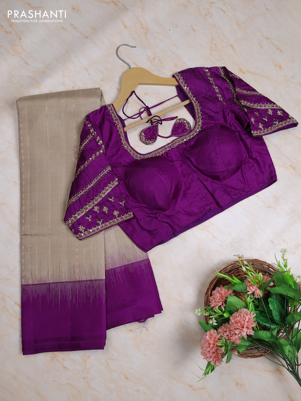 Pure kanchipuram silk saree beige and purple with allover zari weaves & buttas and simple border with Aari work blouse