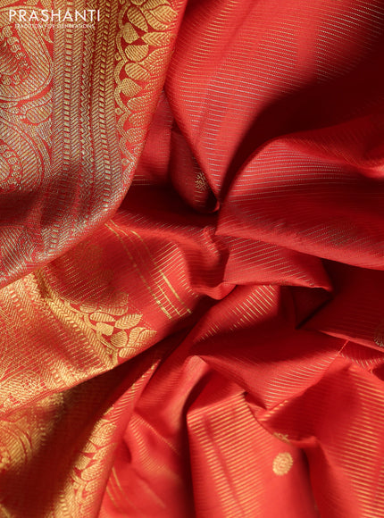 Puer kanchipuram silk saree orange and wiith allover vairaosi & zari woven buttas and zari woven border