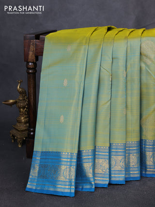 Pure kanchipuram silk saree dual shade of bluish green and teal blue with zari woven buttas and zari woven border