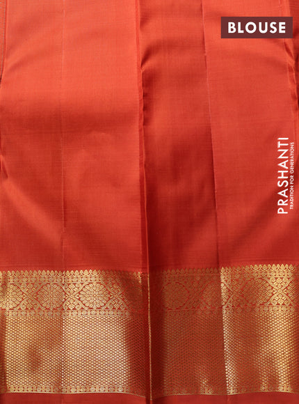 Puer kanchipuram silk saree rust shade with allover zari checks & buttas and zari woven border