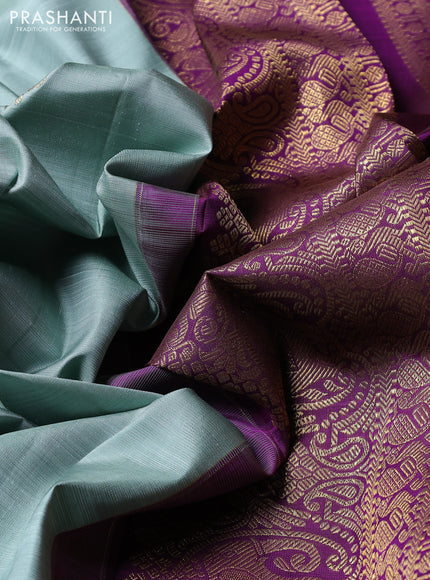 Puer kanchipuram silk saree pastel green and purple with zari woven buttas and zari woven korvai boredr