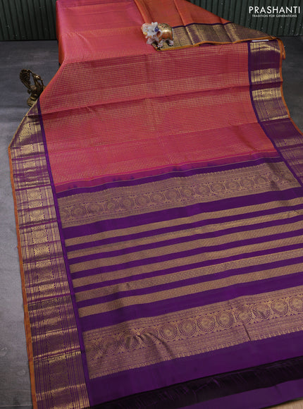 Puer kanchipuram silk saree dual shade of rust and mustard yellow with allover small zari checked pattern and zari woven korvai border