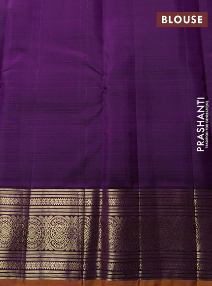 Puer kanchipuram silk saree dual shade of rust and mustard yellow with allover small zari checked pattern and zari woven korvai border