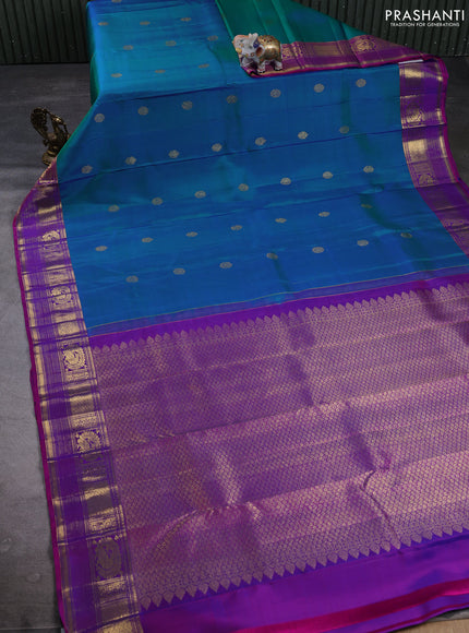 Puer kanchipuram silk saree dual shade of bluish green and pink with zari woven buttas and zari woven border