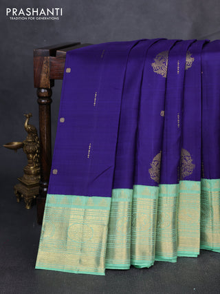 Pure kanchipuram silk saree blue and pastel green with zari woven buttas and long zari woven korvai border