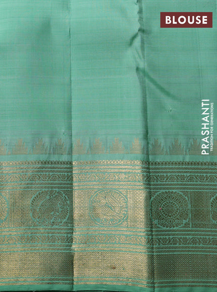 Puer kanchipuram silk saree blue and pastel green with zari woven buttas and long zari woven korvai border