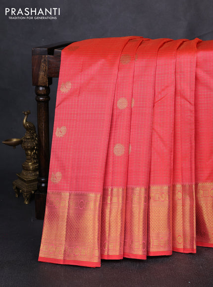 Puer kanchipuram silk saree peach orange with allover small zari checks & buttas and zari woven border
