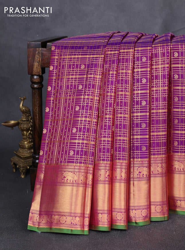 Pure kanchipuram silk saree purple with allover zari checks & buttas and rich zari woven border