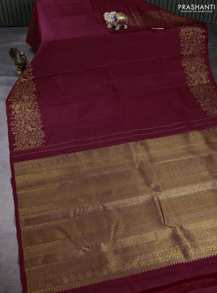 Puer kanchipuram silk saree deep wine shade with plain body and zari woven border