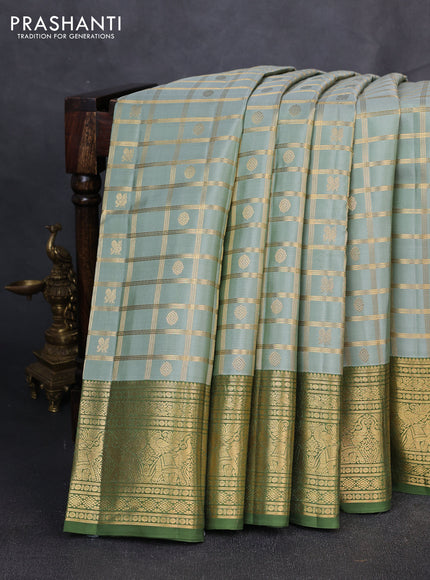 Puer kanchipuram silk saree pastel green and sap green with allover zari checks & buttas and zari woven border