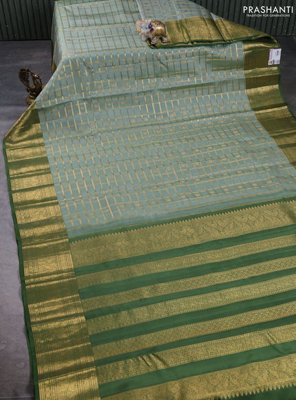 Puer kanchipuram silk saree pastel green and sap green with allover zari checks & buttas and zari woven border