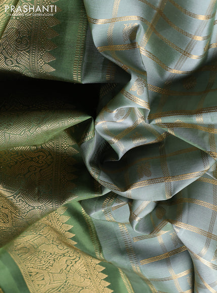 Puer kanchipuram silk saree pastel green and sap green with allover zari checks & buttas and zari woven border