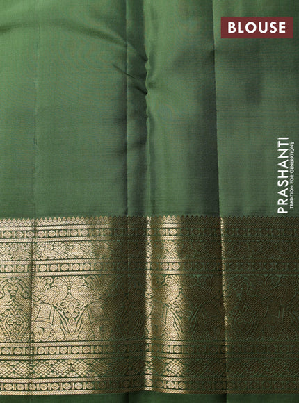 Puer kanchipuram silk saree pastel green and sap green with allover zari checks & buttas and zari woven border