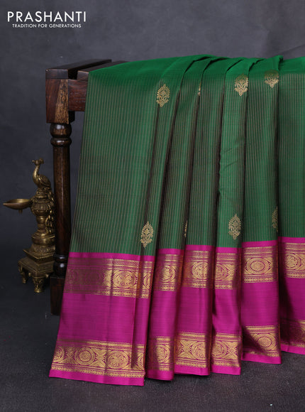 Puer kanchipuram silk saree green and magenta pink with allover zari stripe pattern and rettapet zari woven border