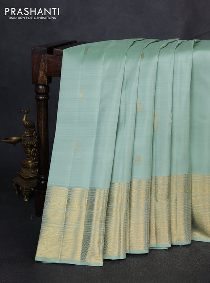 Puer kanchipuram silk saree pastel green with zari woven buttas and long zari woven border