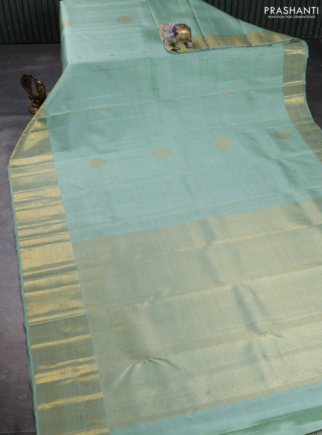 Pure kanchipuram silk saree pastel green with zari woven buttas and long zari woven border