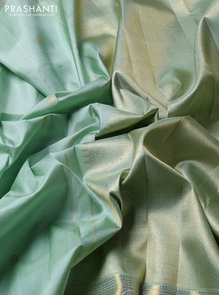 Puer kanchipuram silk saree pastel green with zari woven buttas and long zari woven border
