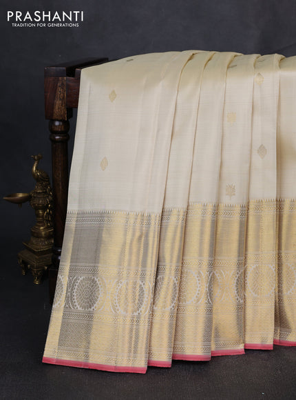 Puer kanchipuram silk saree cream with allover zari woven buttas and long zari woven border