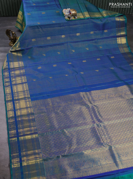 Puer kanchipuram silk saree green shade with allover small zari checks & buttas and long zari woven border