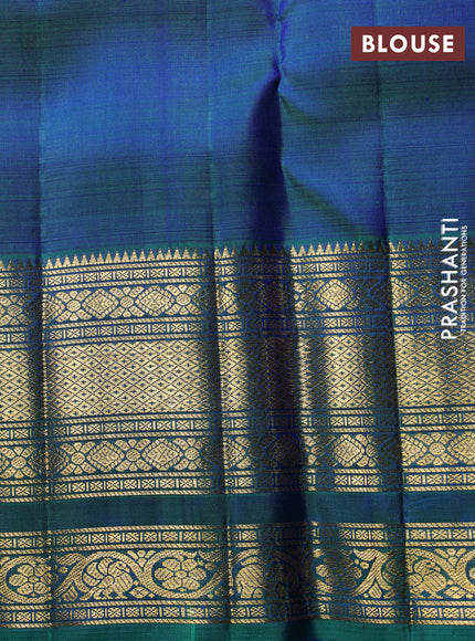 Puer kanchipuram silk saree green shade with allover small zari checks & buttas and long zari woven border