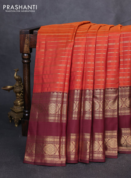 Puer kanchipuram silk saree rust shade with allover zari weaves and long rettapet zari woven border