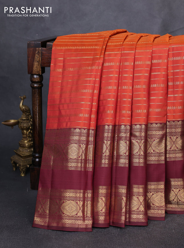 Pure kanchipuram silk saree rust shade with allover zari weaves and long rettapet zari woven border