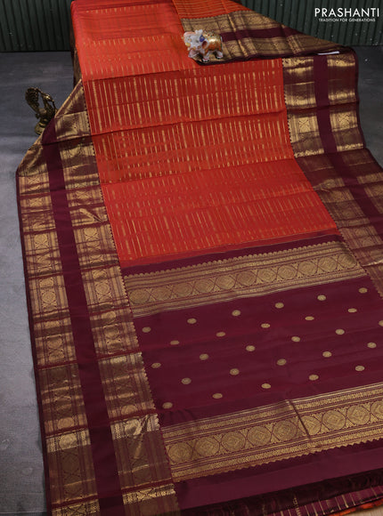 Puer kanchipuram silk saree rust shade with allover zari weaves and long rettapet zari woven border