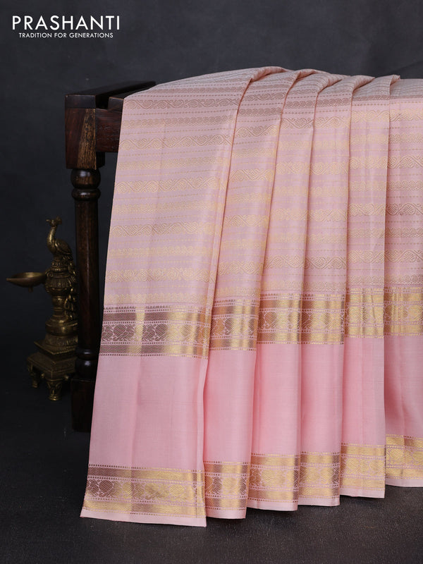 Puer kanchipuram silk saree pastel pink with allover zari weaves and long rettapet zari woven border