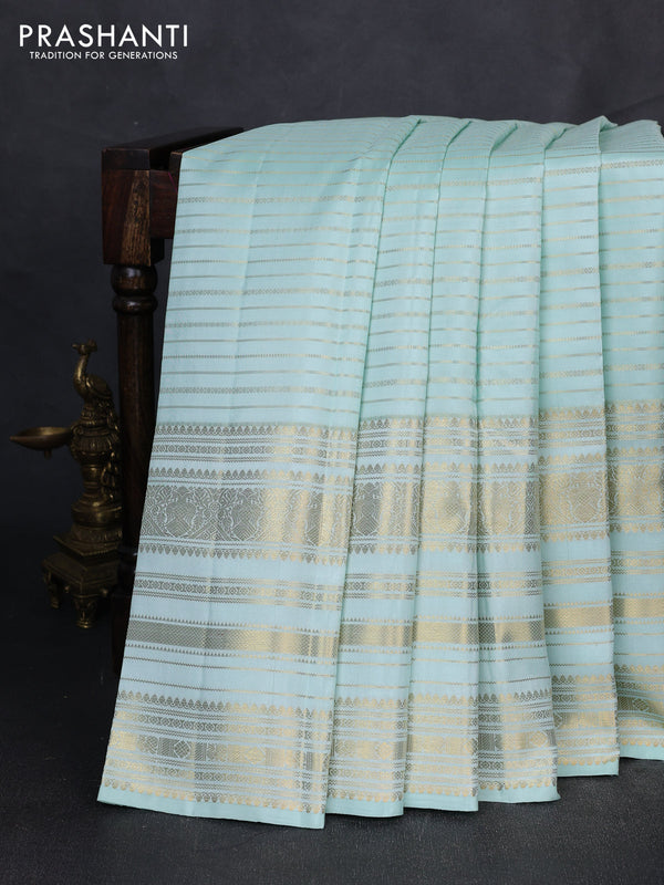 Puer kanchipuram silk saree mild teal with allover zari weaves and long zari woven border