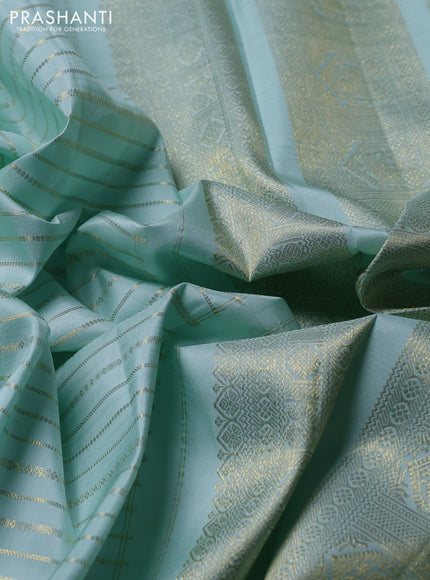 Puer kanchipuram silk saree mild teal with allover zari weaves and long zari woven border
