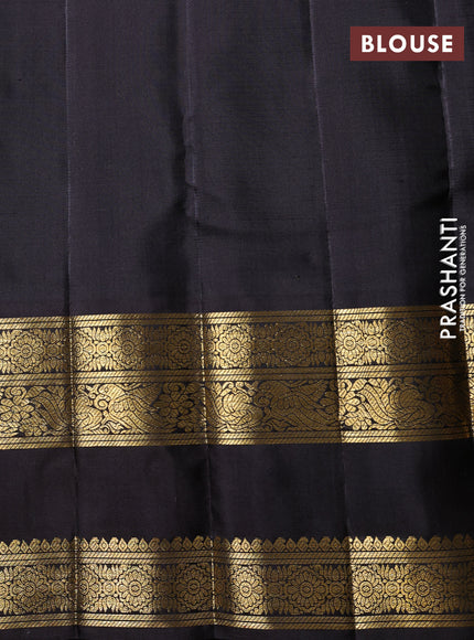 Puer kanchipuram silk saree pastel green and black with allover vairaosi pattern and long zari woven border