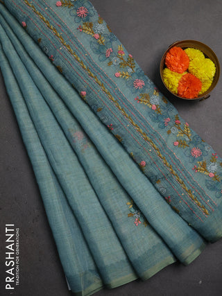 Linen saree teal blue with embroidery buttas and embroidery pallu